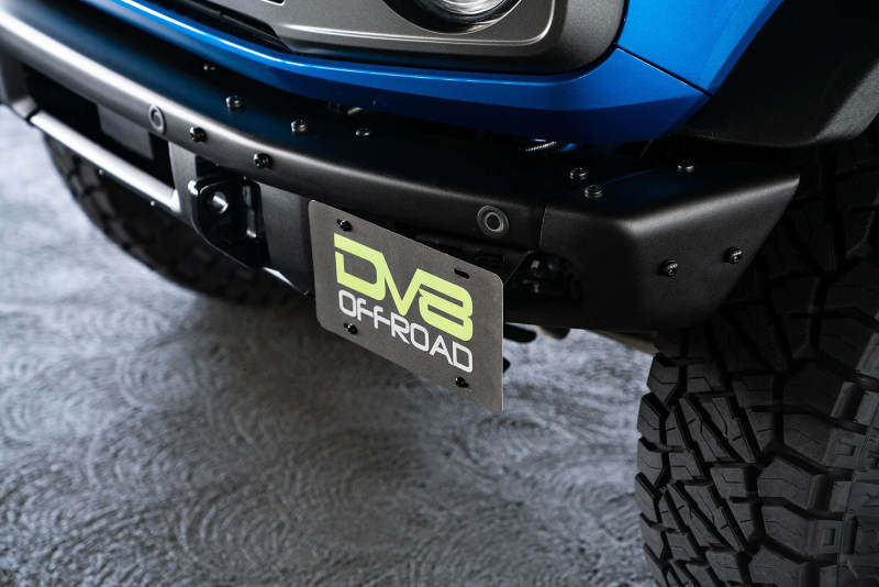 DV8 Offroad 21-22 Ford Bronco Factory Front Bumper License Relocation Bracket - Side - Black Ops Auto Works