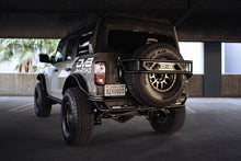 Load image into Gallery viewer, DV8 Offroad 21-23 Ford Bronco Rear License Plate Relocation Bracket - Black Ops Auto Works