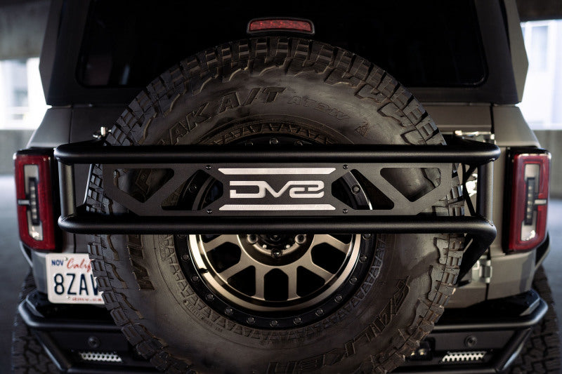 DV8 Offroad 21-23 Ford Bronco Spare Tire Guard & Accessory Mount - Black Ops Auto Works