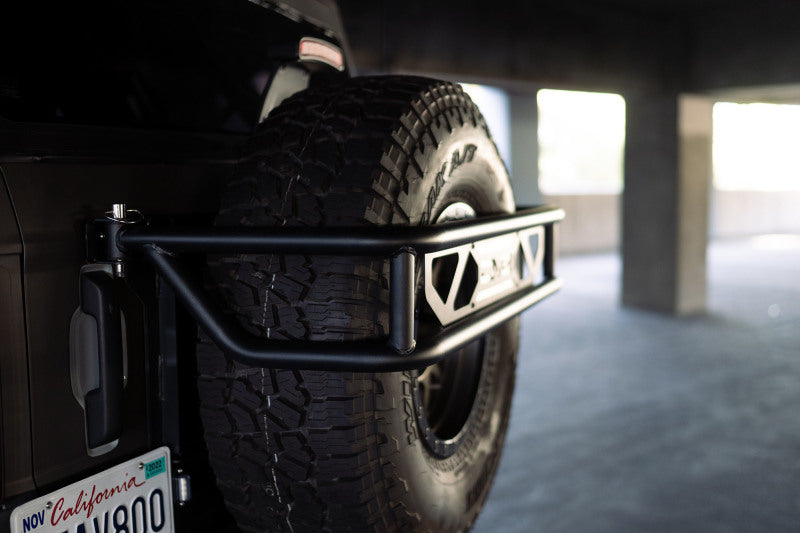 DV8 Offroad 21-23 Ford Bronco Spare Tire Guard & Accessory Mount - Black Ops Auto Works