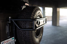 Load image into Gallery viewer, DV8 Offroad 21-23 Ford Bronco Spare Tire Guard &amp; Accessory Mount - Black Ops Auto Works