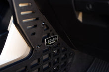 Load image into Gallery viewer, DV8 Offroad 22-23 Toyota Tundra Center Console Molle Panels/Device Mount - Black Ops Auto Works