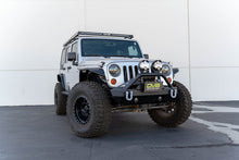 Load image into Gallery viewer, DV8 Offroad Fairlead Mounted Flip-Up License Plate Bracket DV8 Offroad DVELPBM-02