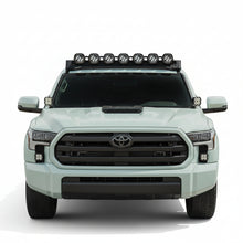 Load image into Gallery viewer, Close-up of the mount's bolt-on bracket that attaches to the DV8 roof rack light option.