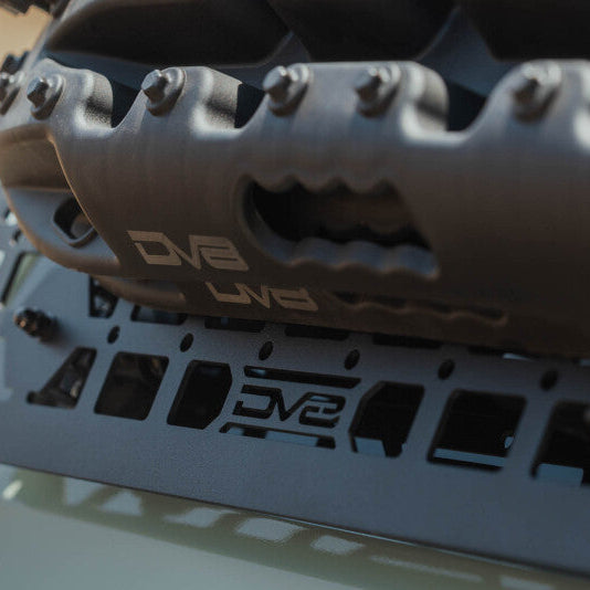 Close-up of the molle panel's 1.5-inch by 1-inch cutout grid pattern.