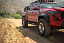 Load image into Gallery viewer, DV8 Offroad 24-25 Toyota Tacoma Double Cab Rock Sliders view 4