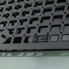 Load image into Gallery viewer, Close-up of the black powder-coated Molle grid openings