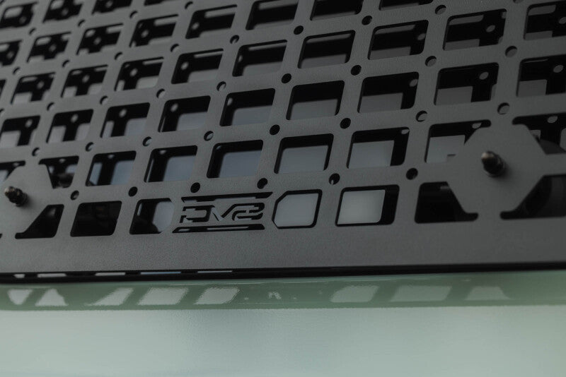 DV8 molle panel branding and weave detail close-up