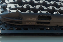 Load image into Gallery viewer, DV8 molle panel weave pattern with embossed DV8 logo, close-up detail