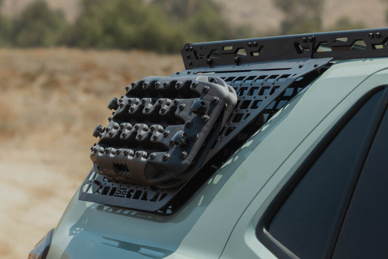 DV8 window molle panel mounted to roof rack, angled close-up