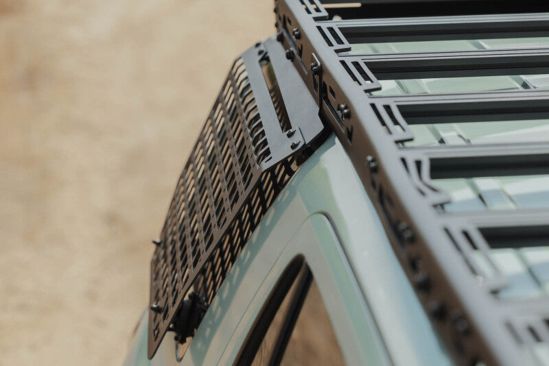 Close-up of DV8 molle panel mounted at roof rack corner joint