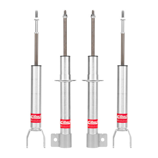 Eibach Pro-Truck lift kit struts, four struts standing upright without springs