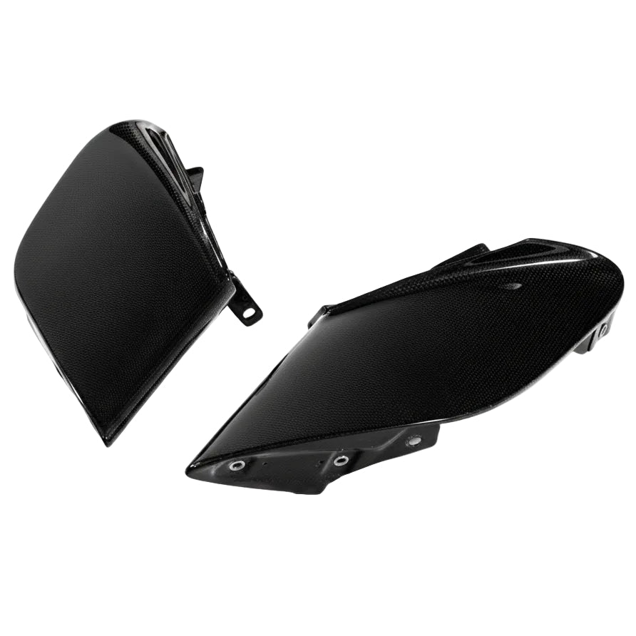Ferrari 488 carbon fiber side intake fin pair photographed together showing the gloss clear coated weave