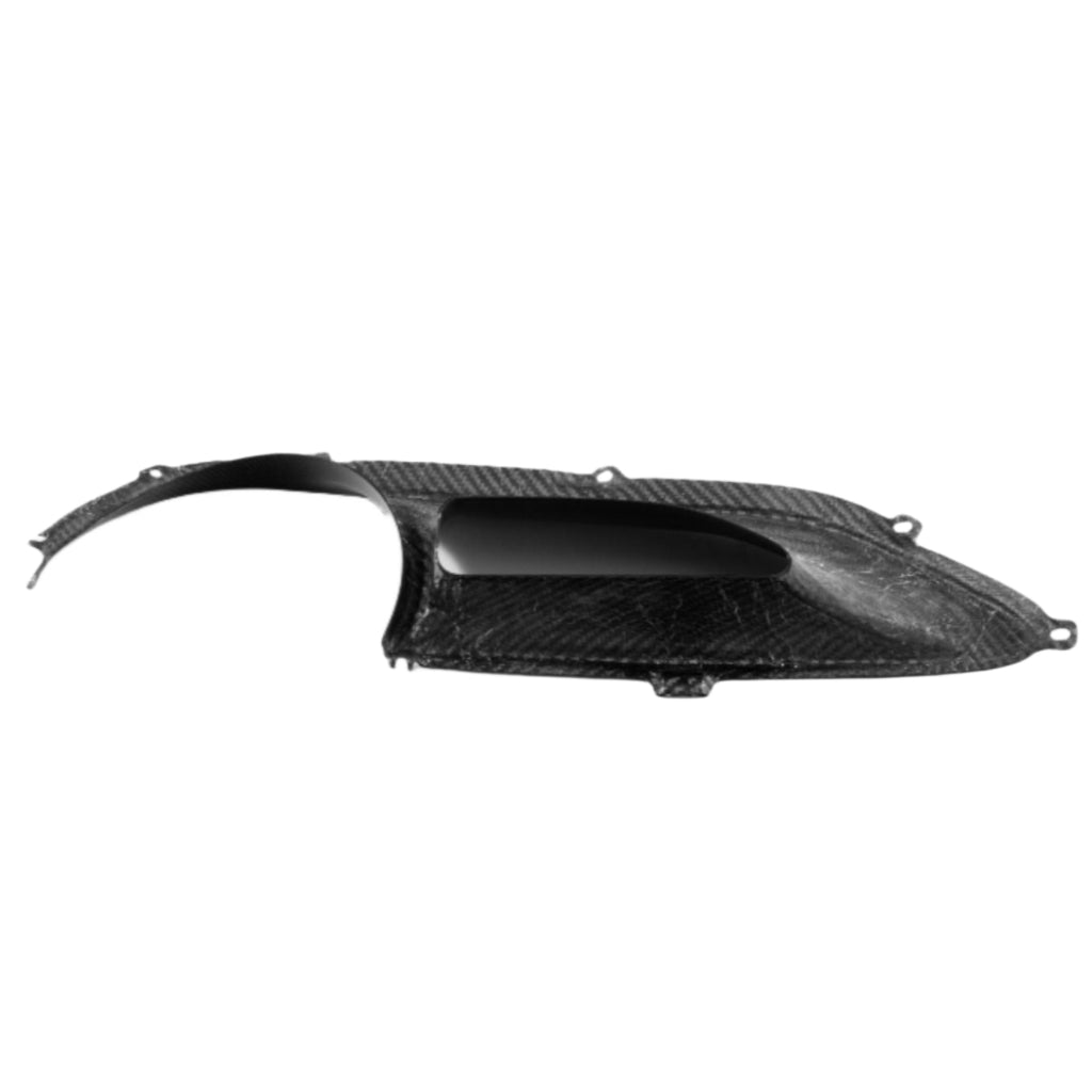 Ferrari 488 carbon fiber tail light surround photographed from a low side profile showing panel depth and weave direction