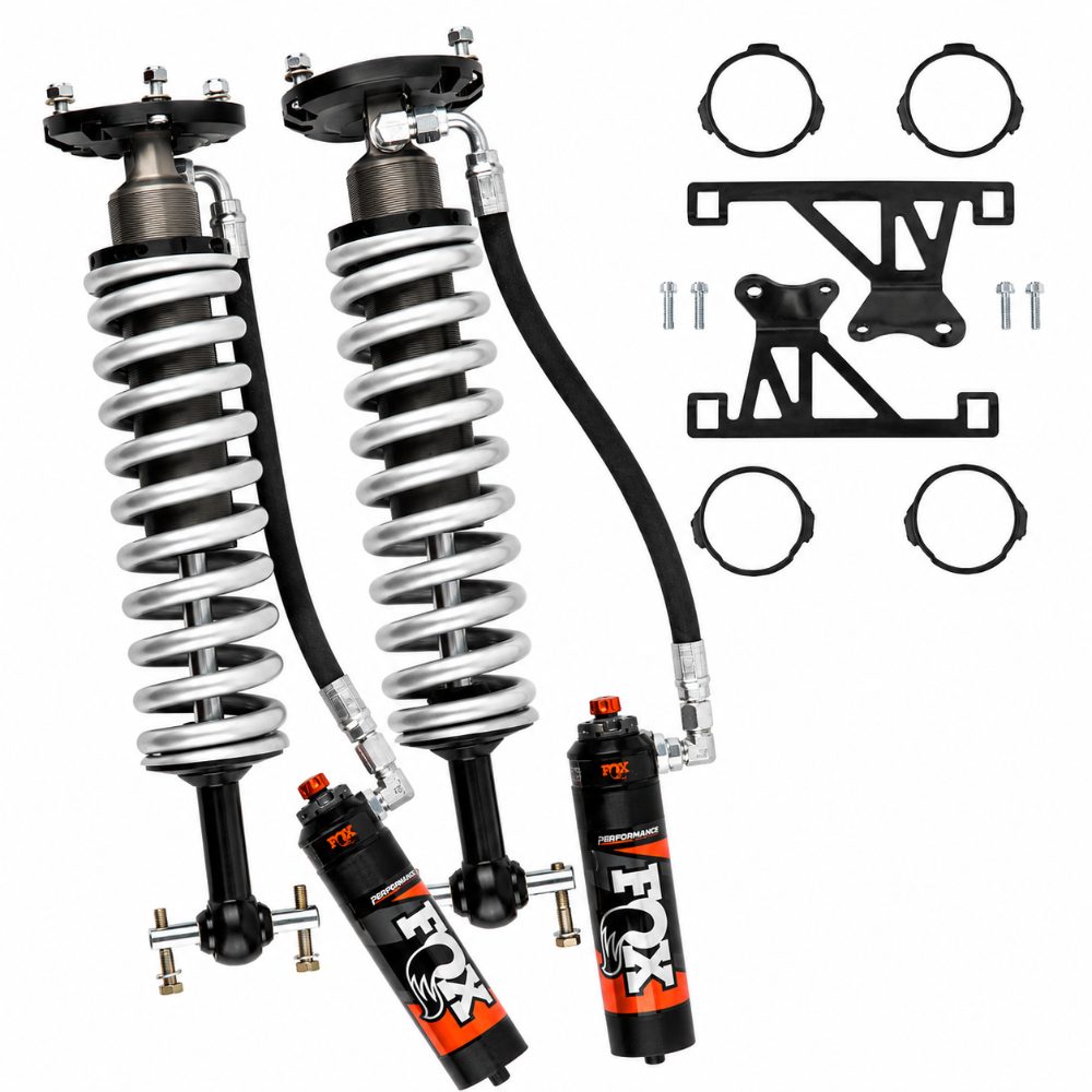 FOX 883-06-164 front coilovers with remote reservoirs, brackets, rings, and mounting hardware.
