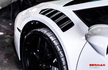 Load image into Gallery viewer, German Rush front fenders in carbon fiber installed on a 2014-2019 Lamborghini Huracan, image 1