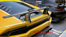 Load image into Gallery viewer, German Rush rear spoiler in carbon fiber mounted on a 2014-2019 Lamborghini Huracan, image 14