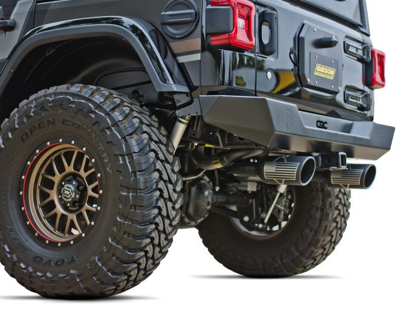 Gibson 12-17 Jeep Wrangler Sport 3.6L 2.5in Patriot Skull Series Cat-Back Dual Exhaust - Blk Ceramic - Black Ops Auto Works