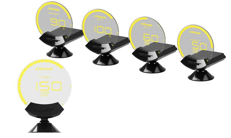 GReddy Sirius thin-film EL gauge illuminated at night for high contrast visibility