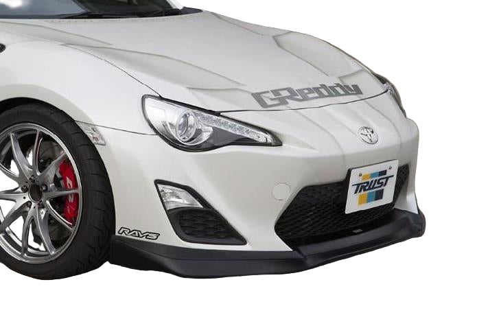 GReddy GRacer aero-style hard urethane front lip spoiler for Scion FR-S on white background