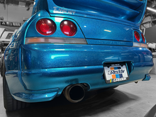 Load image into Gallery viewer, GReddy Total Tune Up License Plate Frame - 3 Color - GReddy 21112000