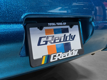 Load image into Gallery viewer, GReddy Total Tune Up License Plate Frame - 3 Color - GReddy 21112000