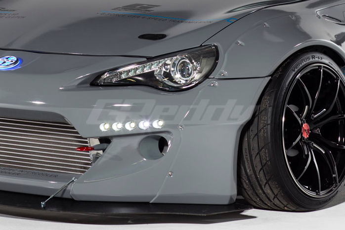 Front view of GReddy Rocket Bunny DRL LED lights installed on Rocket Bunny bumper daytime running lights