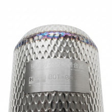 Load image into Gallery viewer, Close-up of HKS turbo kit heat shield mesh cover with compliance label