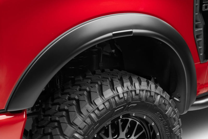 Husky Liners RVL fender flares installed on black 2023-2025 Ford Super Duty truck front view