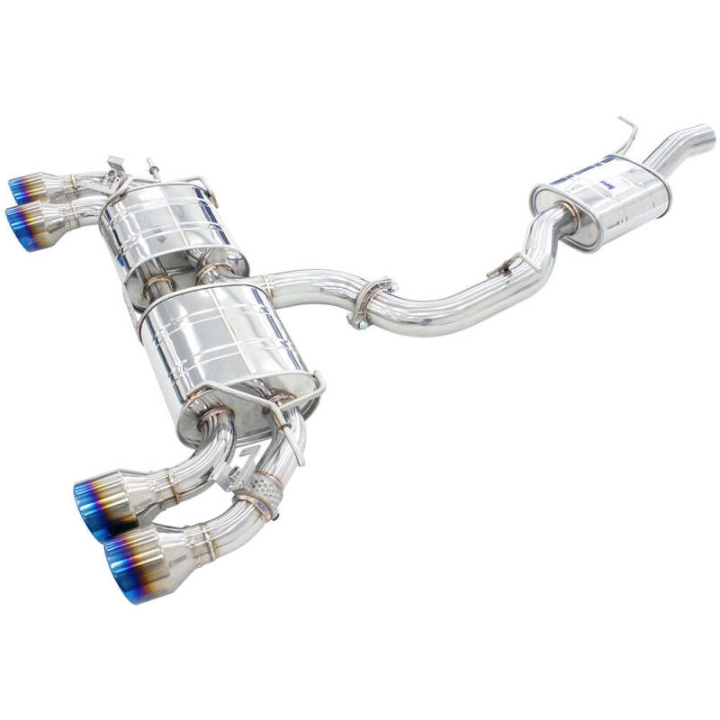 Invidia R400 exhaust angled view showing full piping from front pipe to quad tips