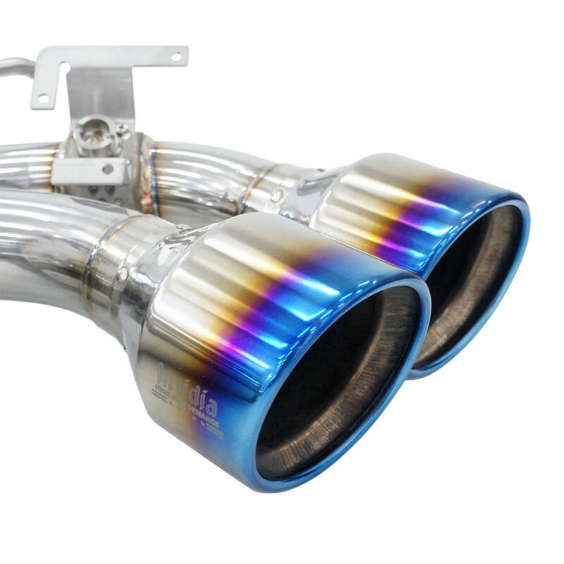 Close-up of the Invidia burnt titanium rolled edge exhaust tips showing color gradient finish
