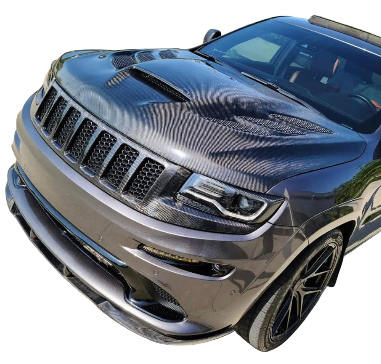 https://www.blackopsautoworks.com/cdn/shop/files/jeep-grand-cherokee-carbon-fiber-headlight-covers-exterior-trim-black-ops-auto-works-2.jpg?v=1703133711