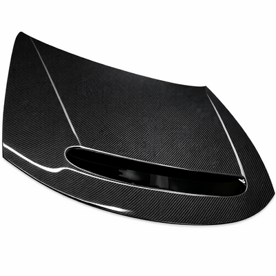 Carbon fiber Demon hood on white background, top angled view showing the raised vent ring