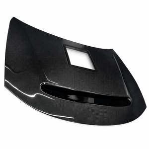 Carbon fiber Demon Window hood, top angled view showing the vent ring and the rectangular clear window