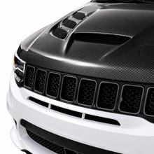 Load image into Gallery viewer, Close-up from the front of the installed carbon Sniper hood showing the centre scoop above the grille