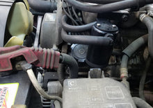 Load image into Gallery viewer, J&amp;L 95-04 Toyota Tacoma/4Runner 3.4L Driver Side Oil Separator 3.0 - Black Anodized - Black Ops Auto Works