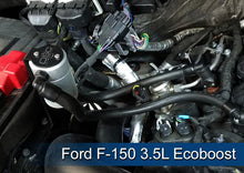 Load image into Gallery viewer, J&amp;L passenger-side oil separator installed in a Ford F-150 engine bay