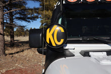 Load image into Gallery viewer, KC HiLiTES 6in. Round Soft Cover (Pair) - Black w/Yellow KC Logo - Black Ops Auto Works