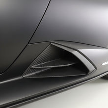 Load image into Gallery viewer, Factory OEM matte black plastic side skirt intake on a red Lamborghini Huracan