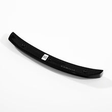 Load image into Gallery viewer, Single Huracan STO carbon fiber wind deflector upright resting beside a second piece with the adhesive pads visible
