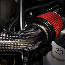 Load image into Gallery viewer, LegMaker carbon fiber short ram intake installed in Jeep Grand Cherokee SRT engine bay