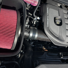 Load image into Gallery viewer, Legmaker carbon fiber mid tube installed in Ram 1500 RHO engine bay