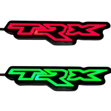 Load image into Gallery viewer, TRX RGB Illuminated LED Emblem Logo - RGB Halo Kits Multicolor Flow Series Color Chasing RGBWA LED headlight kit Oracle Lighting Trendz OneUpLighting Morimoto theretrofitsource AutoLEDTech Diode Dynamics