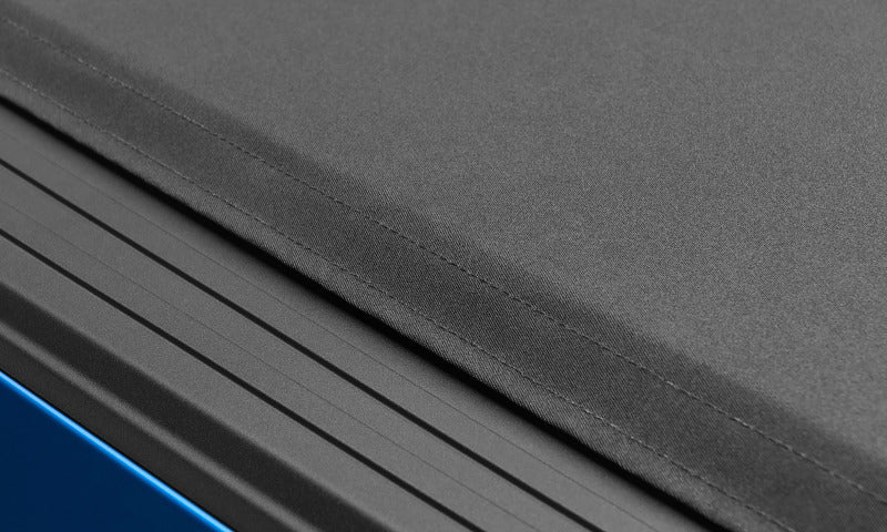 Lund 02-17 Dodge Ram 1500 (5.5ft. Bed) Genesis Elite Roll Up Tonneau Cover - Black - Black Ops Auto Works