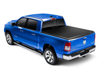 Load image into Gallery viewer, Lund 02-17 Dodge Ram 1500 (6.5ft. Bed Excl. Rambox) Genesis Elite Tri-Fold Tonneau Cover - Black - Black Ops Auto Works