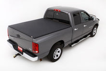 Load image into Gallery viewer, Lund 02-17 Dodge Ram 1500 (6.5ft. Bed Excl. Rambox) Genesis Elite Tri-Fold Tonneau Cover - Black - Black Ops Auto Works