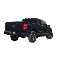 Load image into Gallery viewer, Rear view of MagnaFlow quad 4 inch black chrome tips on Suburban/Yukon XL exhaust