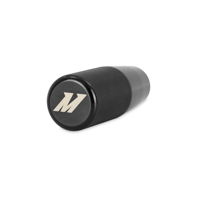 Black Mishimoto XL knurled steel shift knob with universal thread adapters