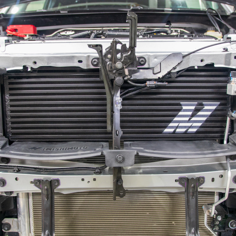 Mishimoto MMINT-TAC-24BK direct-fit front mount intercooler with black powder coat finish
