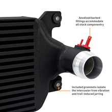 Load image into Gallery viewer, Mishimoto Tacoma intercooler core compared to factory intercooler for improved cooling performance